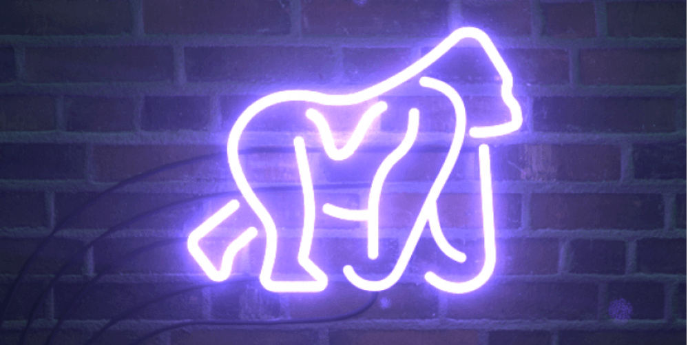 neon gorilla on brick